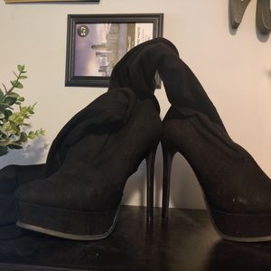 Thigh high black boots